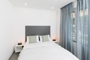 Ένα ή περισσότερα κρεβάτια σε δωμάτιο στο Villa la Matta Apartments and Luxury suites +161 φωτογραφίες