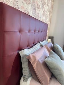 A bed or beds in a room at Porta alla Croce Guest House