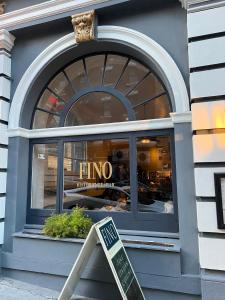a store window with a sign in front of it at The Andrews Hotel in San Francisco