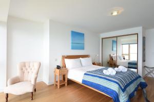 Ένα ή περισσότερα κρεβάτια σε δωμάτιο στο Glas Mor