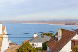 a view of the ocean from a house at Chy Lowen in Carbis Bay