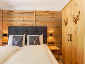 Posteľ alebo postele v izbe v ubytovaní Pinzgau Lodge 1B