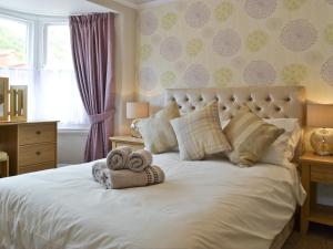 Ένα ή περισσότερα κρεβάτια σε δωμάτιο στο Cliff Railway Apartment