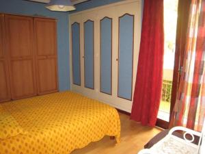 Posteľ alebo postele v izbe v ubytovaní Appartement F3 avec terrasse, parking, Wi-Fi - Idéal cures - Centre-ville Amélie-les-Bains - FR-1-703-87