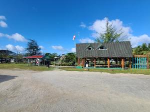 a small house on the side of a road at Winners Residence in Saipan