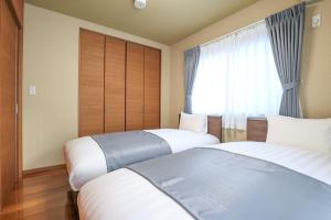 Letto o letti in una camera di 24 ORIYA Mt Fuji -鳴沢 NARUSAWA-