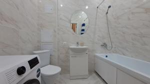 Koupelna v ubytování ЖК SEN 2 Уютная 1-комн квартира в районе Хан-Шатыр