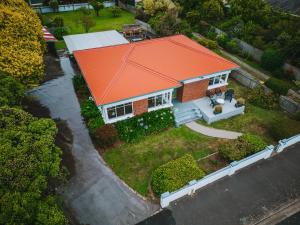 an overhead view of a house with an orange roof at Sunrise at Penguin in Penguin