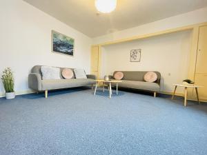 Posezení v ubytování aday - Spacious and beautiful apartment in the center of Frederikshavn