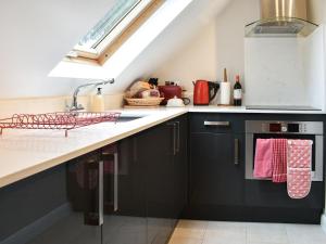 Kuchyň nebo kuchyňský kout v ubytování Souters Cottage