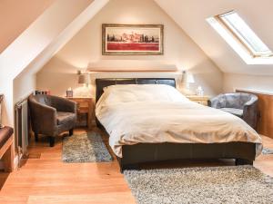 Postel nebo postele na pokoji v ubytování Souters Cottage