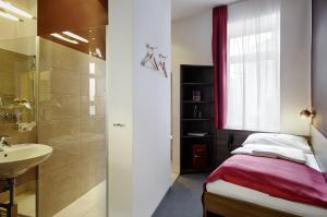 Kúpeľňa v ubytovaní BoutiqueHOTEL Donauwalzer