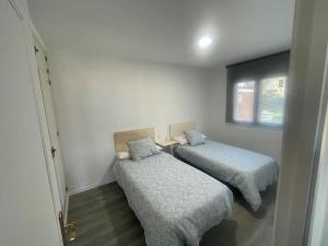 Posteľ alebo postele v izbe v ubytovaní las mejores vistas de malaga
