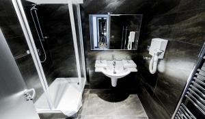 Kúpeľňa v ubytovaní Hotel Herrmes