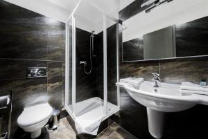 Kúpeľňa v ubytovaní Hotel Herrmes