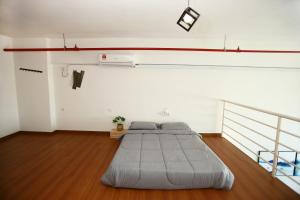 Postel nebo postele na pokoji v ubytování Private 100 inches Screen Cinema at CEO Penang