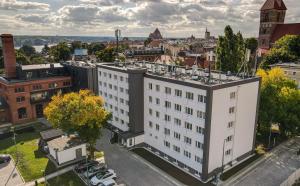 Nespecifikovaný výhled na destinaci Toruň nebo výhled na město při pohledu z hotelu