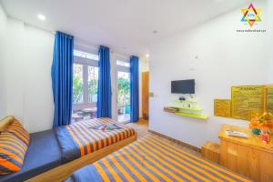 Μια τηλεόραση ή/και κέντρο ψυχαγωγίας στο Villa Tuan Vu Da Lat +27 φωτογραφίες