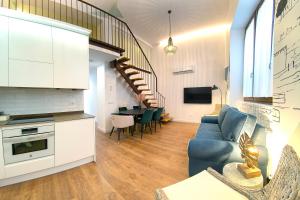 A kitchen or kitchenette at Cervantes 5 Collection Catedral - Alcántara