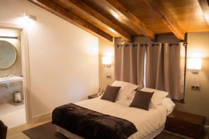 Cama o camas de una habitación en Osabarena Hotela