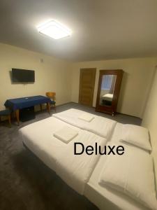 Llit o llits en una habitació de Leśna Polana