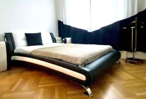 Postel nebo postele na pokoji v ubytování Apartment Central