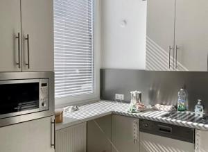 Kuchyň nebo kuchyňský kout v ubytování Apartment Central