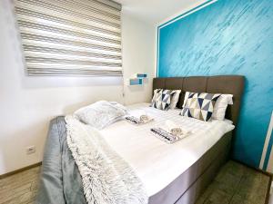 Posteľ alebo postele v izbe v ubytovaní Luxury Apartman ASIA Rijeka