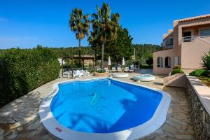 The swimming pool at or close to Villa Cas Puig - Beach of Portinatx
