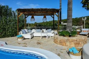 The swimming pool at or close to Villa Cas Puig - Beach of Portinatx