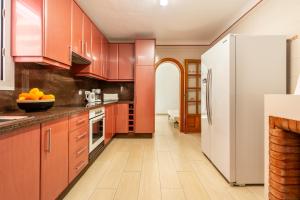 A kitchen or kitchenette at Villa Cas Puig - Beach of Portinatx