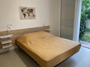 Posteľ alebo postele v izbe v ubytovaní 2 chambres et jardin à Bormes - Le Lavandou
