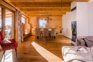 Posezení v ubytování Hochleben-Chalets am Erlebnisbauernhof Steinerhof