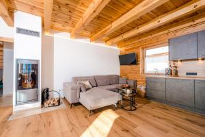 Kuchyň nebo kuchyňský kout v ubytování Hochleben-Chalets am Erlebnisbauernhof Steinerhof