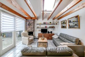 Гостиная зона в Vakantiehuis Nordseezauber - Callantsoog aan Zee