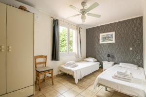 Łóżko lub łóżka w pokoju w obiekcie Villa Cosy