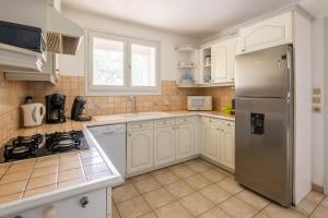 Kuchnia lub aneks kuchenny w obiekcie Villa Cosy