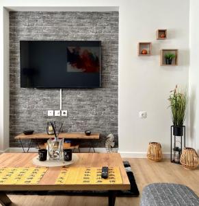 TV a/nebo společenská místnost v ubytování Seaside Casa