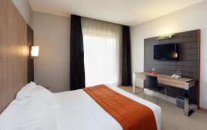 TV a/nebo společenská místnost v ubytování THotel Lamezia