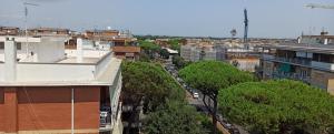an overhead view of a city with trees and buildings at Attico Ostia in Lido di Ostia