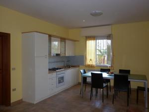 A kitchen or kitchenette at Villa Jolanda