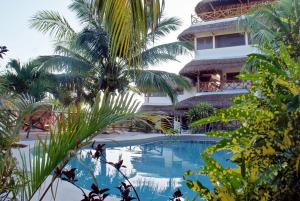 Bazén v ubytování Ensueño Holbox & Beach Club nebo v jeho okolí