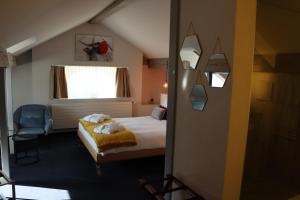 Krevet ili kreveti u jedinici u okviru objekta La Clef D'Or Auberge Communale