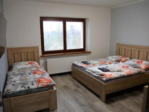 Postel nebo postele na pokoji v ubytování 100dola