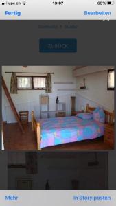 韋基奧港的聖塔露西的住宿－Maison Le Guetali，一张房间卧室的照片