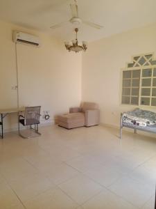 Posezení v ubytování Al Dhait Residence
