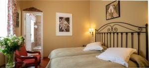 A bed or beds in a room at Malpais Trece