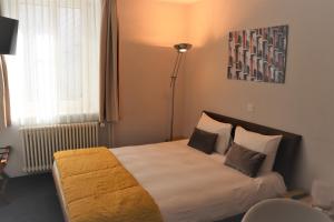 Krevet ili kreveti u jedinici u okviru objekta La Clef D'Or Auberge Communale