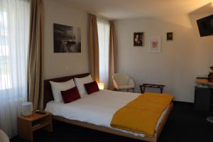 Krevet ili kreveti u jedinici u okviru objekta La Clef D'Or Auberge Communale