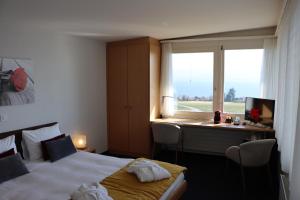 Krevet ili kreveti u jedinici u okviru objekta La Clef D'Or Auberge Communale